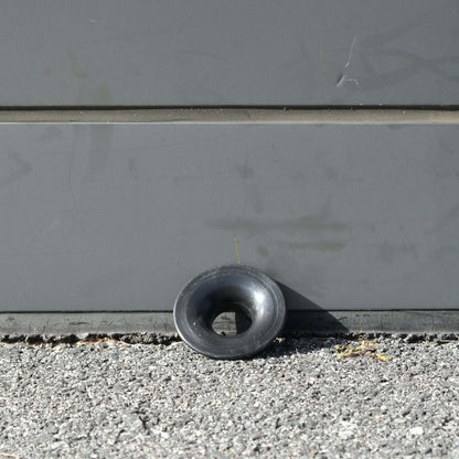 FLOAT SAVER 25MM on asphalt ground, designed to protect floats from damage caused by ropes.