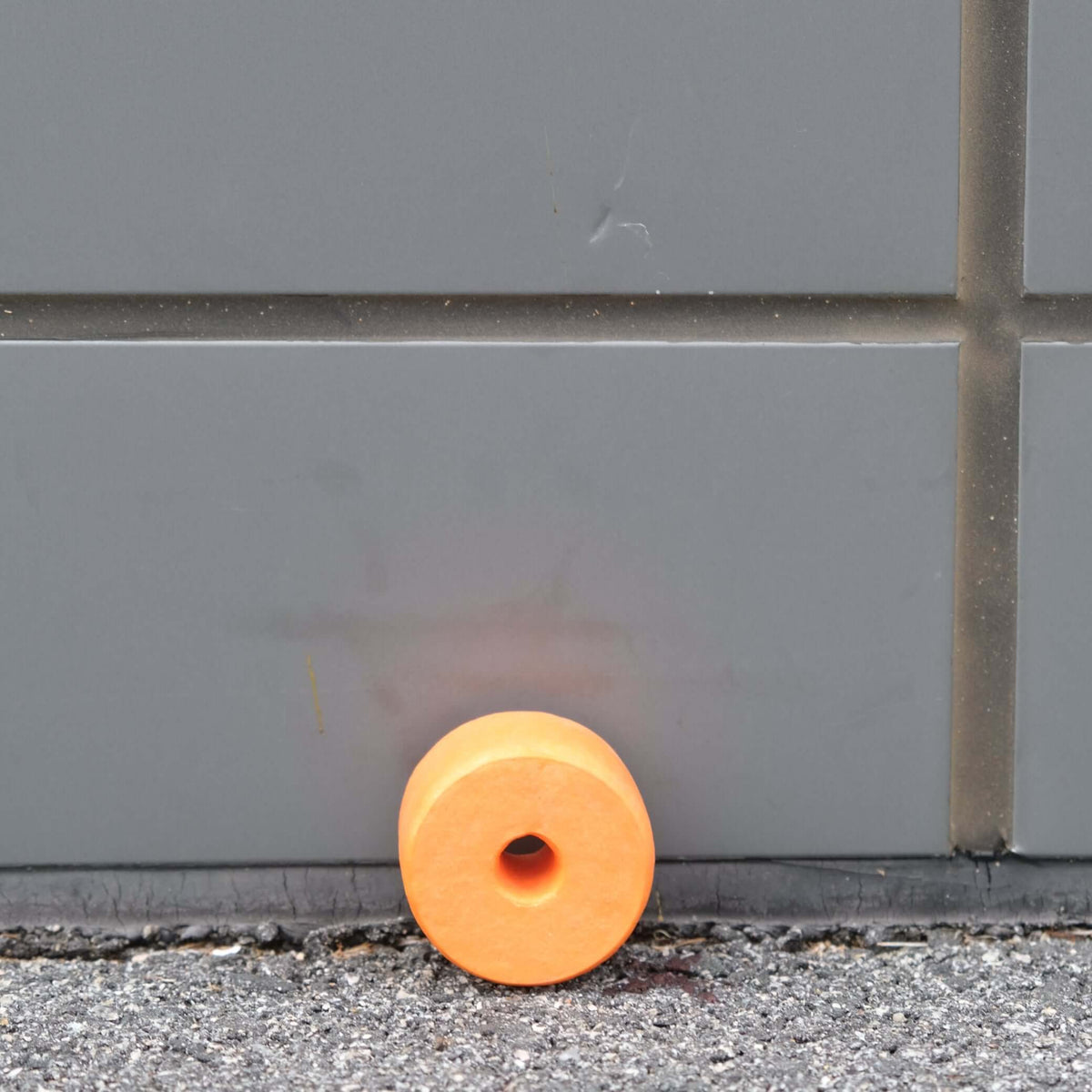 FLOAT S2 - 55 X 40 X 10MM BORE, an orange float with a 10mm diameter bore, ideal for nets and traps.