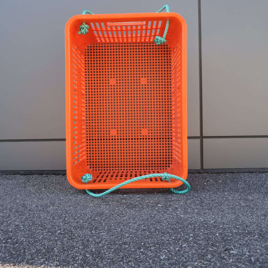 Orange LUG BASKET/ HANDLES/ LID 66L crate with two rope handles for secure storage.