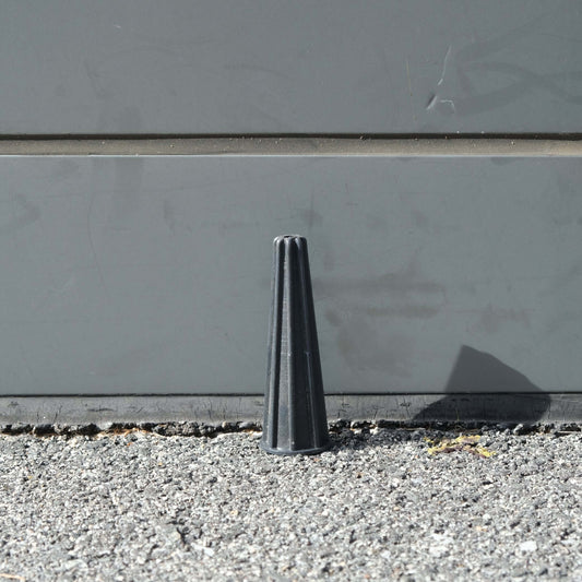 ROPE SMOOTHER tool leaning against a surface, designed to finish rope edges neatly after splicing.
