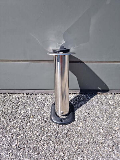 VERTICAL ROD HOLDER WITH CAP mounted on a surface, showcasing its sleek stainless steel design.