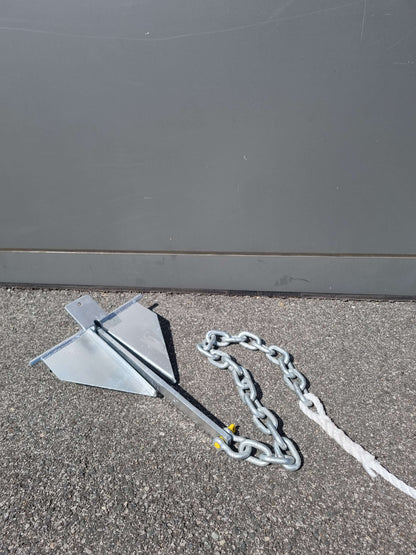 Danforth anchor from SAND ANCHOR KITS with 1m chain and 25m rope on pavement.
