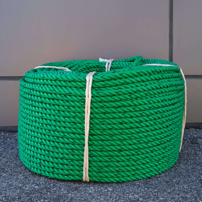 ROPE PE 12MM X 220M GRN/BLK bundled green polyethylene rope with visible coiling characteristics