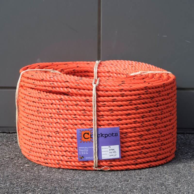 ROPE PE 14MM X 220M ORA/BLK shown coiled, highlighting its durability and excellent UV resistance.