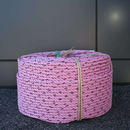 ROPE PP 11MM X 220M PINK/BLK, braided pink and black polypropylene rope coiled for easy handling and storage.