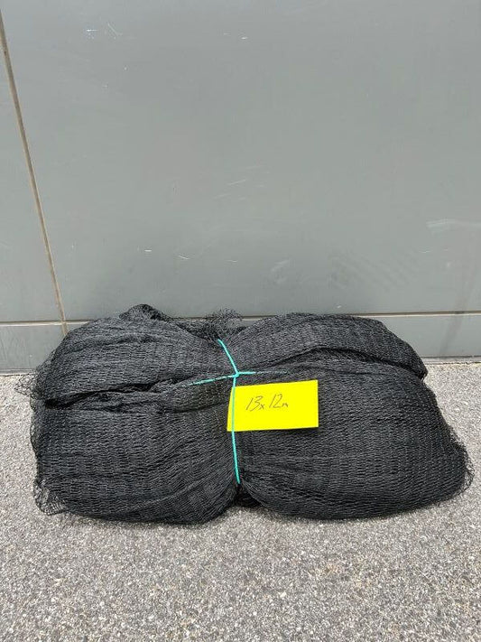 6 Ply Throwover Netting 13x12m, black bird netting rolled and secured for easy application