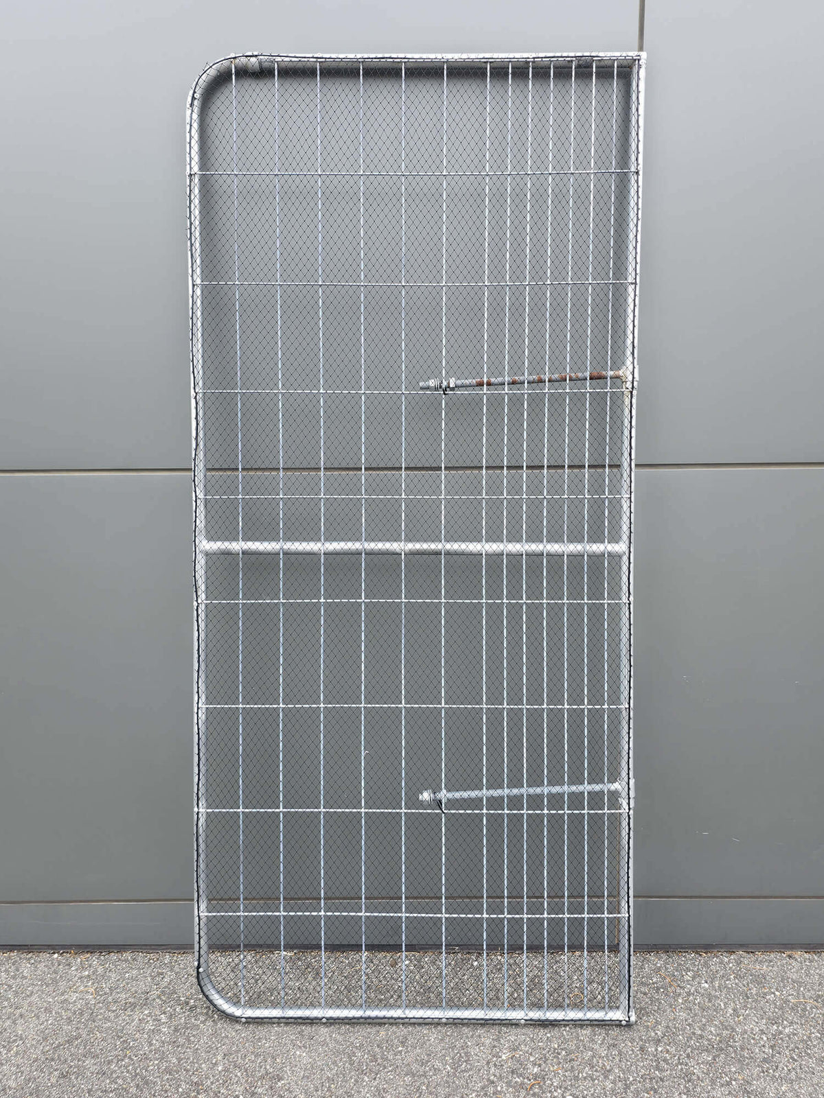 Pedestrian Gate 2.4m H x 1.1: Galvanised gate design with bird netting for access into orchard structures.